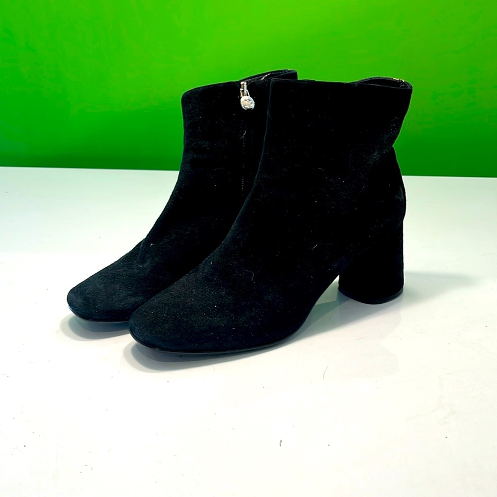 Funky suede black booties with gold ribbon accent on back. Heel is round.